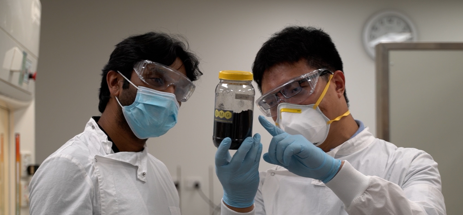 GMG laboratory team inspecting graphene material
