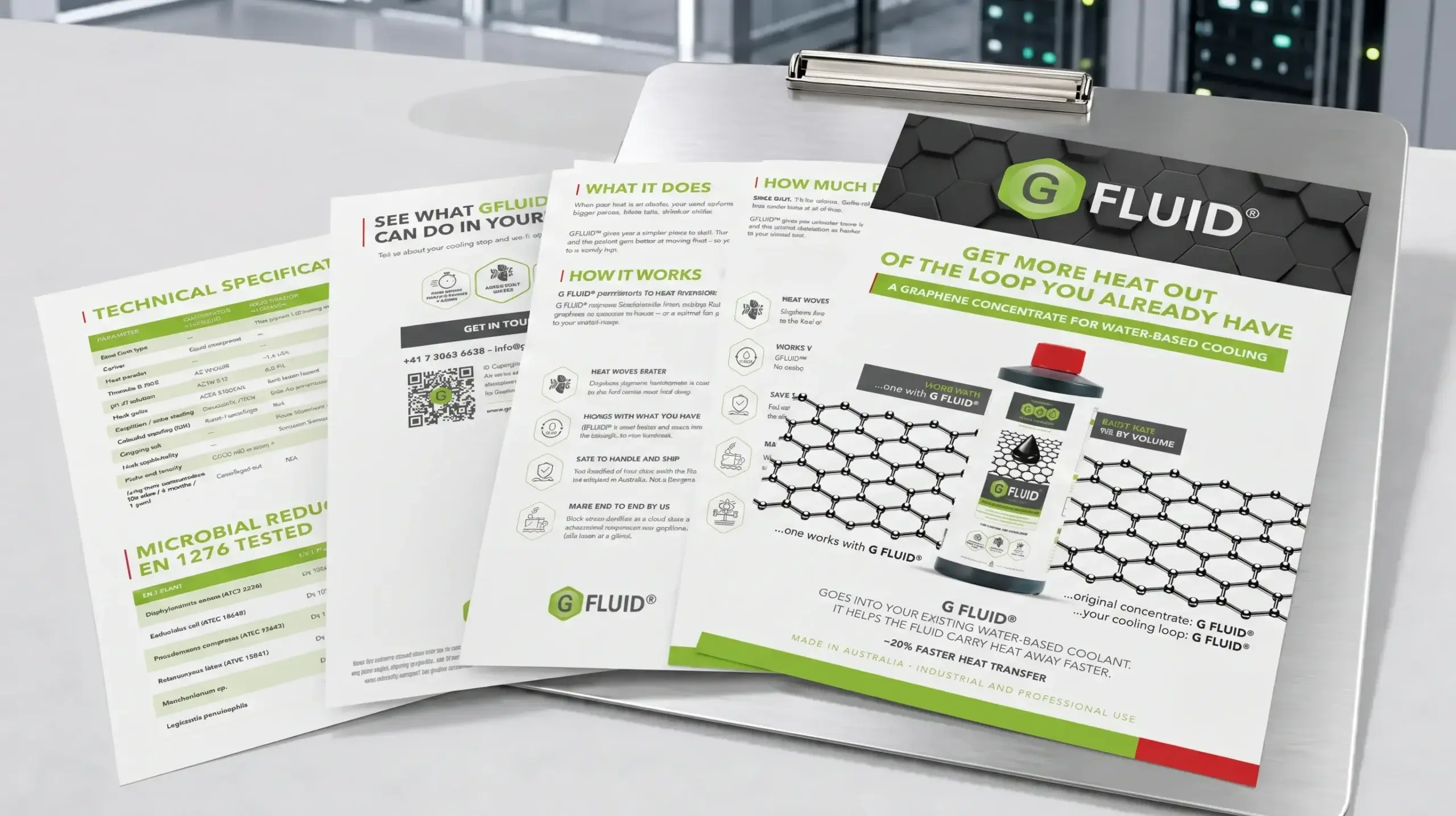 A clipboard holding a multi-page sales brochure for G FLUID® water-based cooling additive, resting on a desk with data center servers blurred in the background.